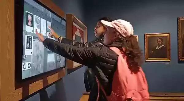 Users interacting with the application in the museum